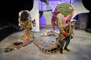 A scene with two actors dressed as dung beetles from The Insect Play